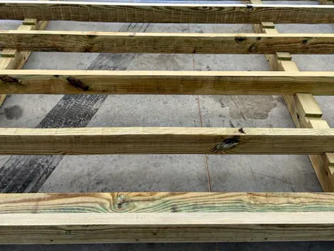 treated 2x6 wood floor frame on wood high barn sheds